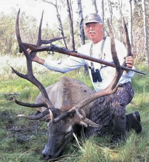 Retired Vice President Gordon McCleary with Saskatchewan Elk with 1873 Springfield 45/70.