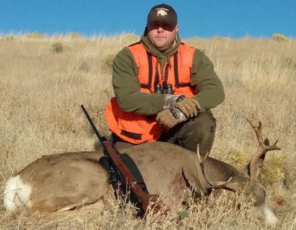Son of retired Vice President Gordon McCleary Junior with a nice public land Mule Deer in the State of Washington.
