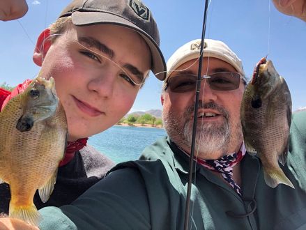 Darren Enns and Ethan Enns at Veterans Memorial Pond.